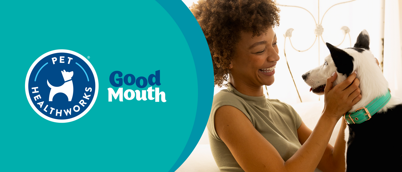 Woman petting a dog with Pet HealthWorks Good Tummy logo